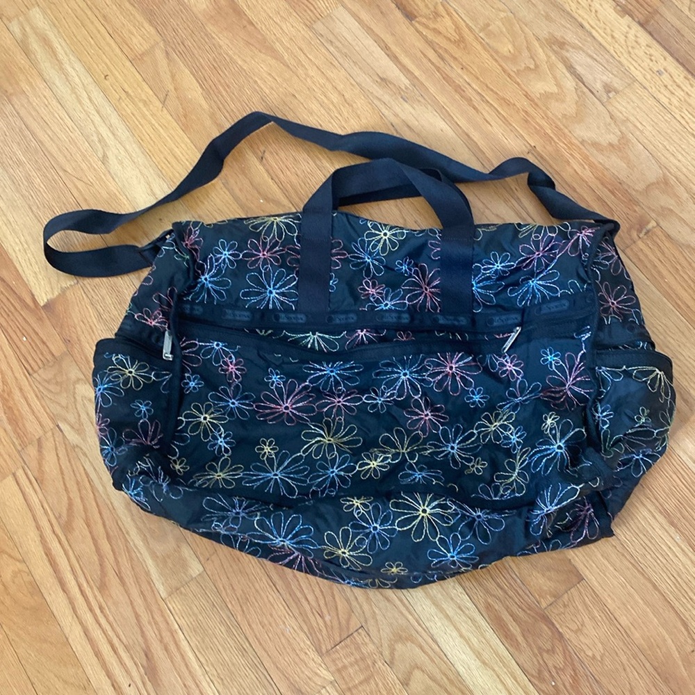 Le sportsac black embroidered duffle with hand & shoulder handles